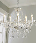 6 Light Black Crystal Chandelier With K9 Crystals, Modern Ceiling Fixture hanging in a room, elegant and sparkling