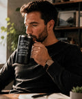 Man sipping from Bro Approved 20oz Stainless Steel Insulated Coffee Mug With Sweet Quote in matte black finish.