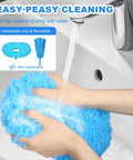 Ceiling Fan Cleaner Duster With Adjustable Extension Pole And Interchangeable Head being washed in a sink, blue head in focus.
