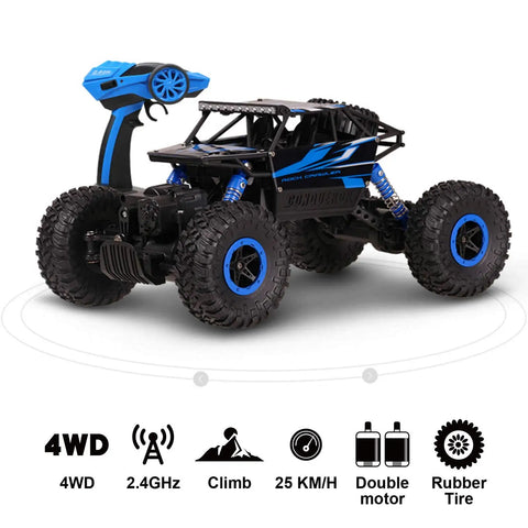 One Eighteen Scale Rock Crawler Remote Control Car With Four Wheel Drive And Two Point Four GHz Off Road Monster Truck Dual Battery Setup Blue Finish For Rugged Trails Pebbles And Dirt, showing 4WD and oversized tires