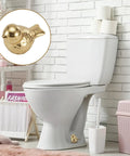 Two Pack Gold Bird Toilet Bolt Covers Decorative Screw Caps Glossy Finish on white toilet in stylish bathroom setting.