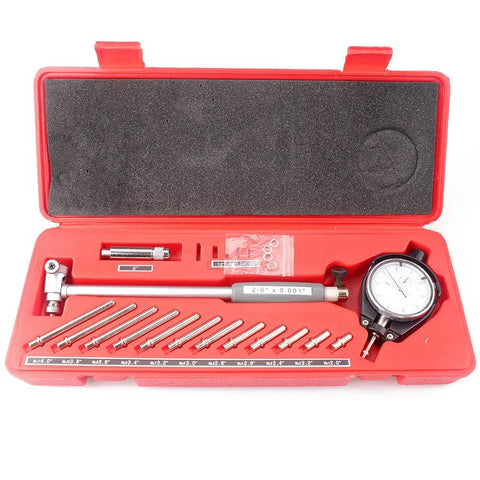 Front view of red Oudtinx dial bore gauge set in case, 2.0–6.0 in range, with dial indicator and measuring rods.
