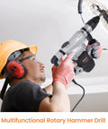 Worker using Heavy Duty SDS Max Rotary Hammer Drill With Vibration Control And Safety Clutch 13 Amp Powerhouse for ceiling work