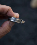 Ultra Tiny Titanium Ti Tape Retractable Mini Tape Measure With 3 Feet Range, Imperial And Metric, side view in hand