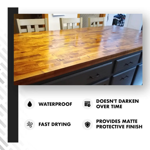Top Shelf Dark Tung Oil Wood Finish Blended With Citrus Orange Peel Oil For Cutting Boards And Butcher Blocks Food Grade Matte Sealant No Sweat Application Badass Long Lasting Protection 32 Oz Container on a wooden countertop.