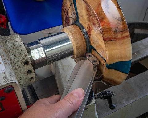 Pro Grade Woodturning Tool Rest Platform With Post And Collar For Scrapers And Turning Tools, Hollowing Ready, Beefy Stainless Steel Platform, 5 7 Or 9 Inch Lengths, 1 Inch Post, 7 Inch Wide Rest, USA Made tool rest in use on a wood lathe