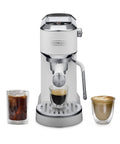 Compact Espresso And Cold Brew Coffee Maker Featuring Built In Milk Frother Wand brewing shots with iced coffee and latte.