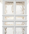 Close-up of white Craftsman Style Outdoor Wall Light in 12 inch tall sconce with clear hammered glass panes for porch or entry.