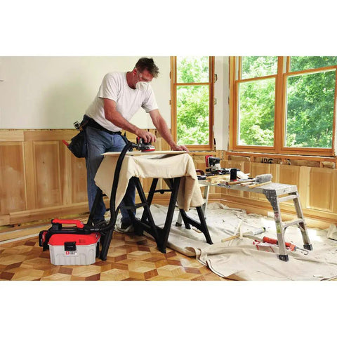 Person using 20V Max Cordless 5 Inch Random Orbital Sander Tool Only With Detachable Dust Bag Vacuum Port indoors on wood surface