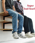 Two men sitting on Beefy Heavy Duty Wall Mounted Lumber Rack With Six Levels Holds Up To 1200 Lbs Ideal For Garage, Workshop Or Shed