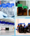 Assorted glass bottles with blue and green screw caps displayed in a laboratory setting.