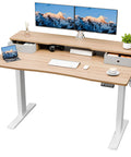 Smooth Shift Electric Standing Desk 50X26 Inch with solid maple surface, dual drawers, and dual monitors for home office setup.