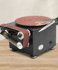 Versatile Mini Belt Disc Sander With 6-Inch Sanding Wheel And Small Grinder For Wood Metal Working in use with scissors.