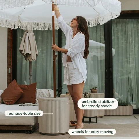 Patio Must Have Weatherproof Umbrella Side Table With Hole Durable Plastic Stone Combo by poolside, showing side table use.
