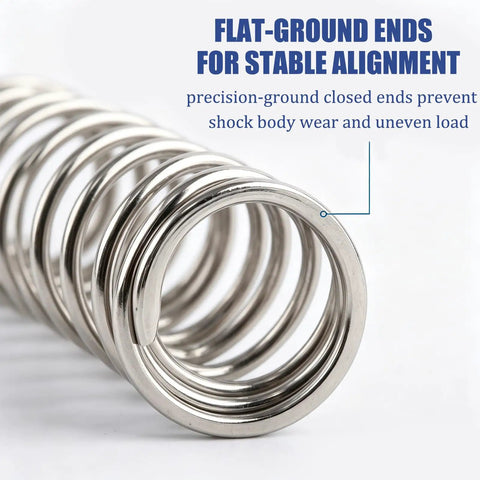Close-up of a silver spring with flat-ground ends, part of the Progressive Shock Spring Set For Arrma Grom Typhon 1/14 Mojave