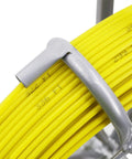 Close-up of gray hook on yellow fiberglass rod of 6mm diameter on a steel reel, part of Fiberglass Duct Rod Fish Tape Puller Kit with 450 feet.