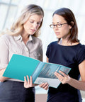 Two women reviewing documents in Meeting Ready 24-Pocket Presentation Binder For 8.5x11 Documents, Aqua Portable Portfolio For Meetings