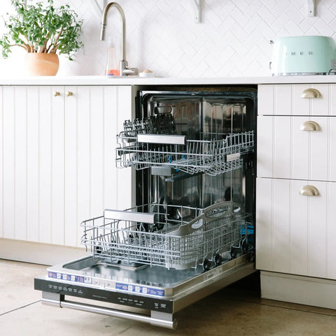 Open dishwasher with visible racks in a home kitchen setting