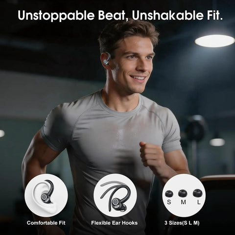 Man running indoors wearing Bluetooth 5.3 Wireless Earbuds With ENC Microphone Deep Bass IPX7 Waterproof 48 Hour Playtime Secure Earhooks