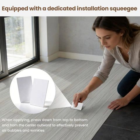Woman installing Peel And Stick Floor Tiles 30 Sq Ft Pack With Natural Wood Look Vinyl Plank Flooring No Mess Easy Install Self Adhesive Waterproof And Durable For Bedroom Kitchen RV Bathroom And Living Room 36 In By 6 In using squeegee