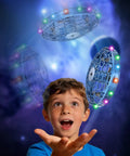 Child playing with Kids Flying Toy Drone With 360 Degree Motion Sensor Gesture Control And LED Lights Indoor Safe UFO Mini Drone.