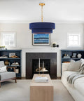 ELYCCUPA 20” Navy Blue Boho Hand Woven Pendant Light Brass Adjustable Coastal Chandelier in living room setting.
