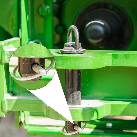 Three Pack Linch Pin With Ring Set 1/2 Inch By 2-3/4 Inch Carbon Steel Trailer Pins installed on green outdoor equipment