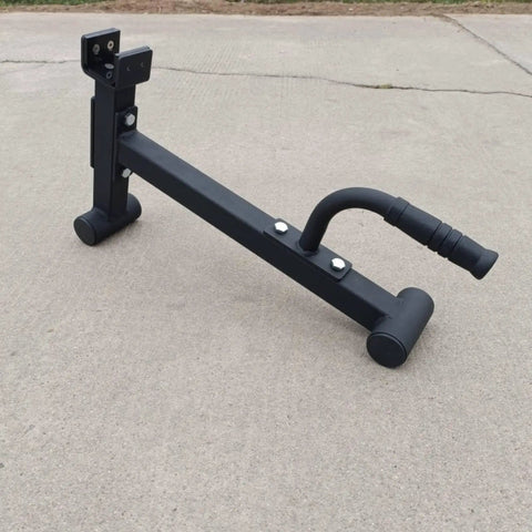 Heavy Duty Barbell Plate Lifter And Plate Change Jack with secure curved handle on concrete surface.