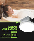 Woman relaxing in a bathtub with Whisper Quiet Integrated LED Light Ceiling Mount Bath Exhaust Fan 110 CFM 2.0 Sones