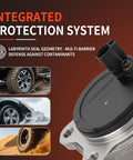 Close-up of integrated protection system on a wheel hub with labyrinth seal, showing off-road, wet, and sandy conditions.