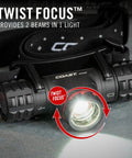 1200 Lumen USB C Rechargeable Dual Power Headlamp with Twist Focus Beam and Magnetic Base on concrete surface
