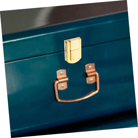Close-up of gold Retro Style Lock Latch Clasp Kit For Wooden Boxes And Jewelry Cases Secure Closure Hardware on green box lid