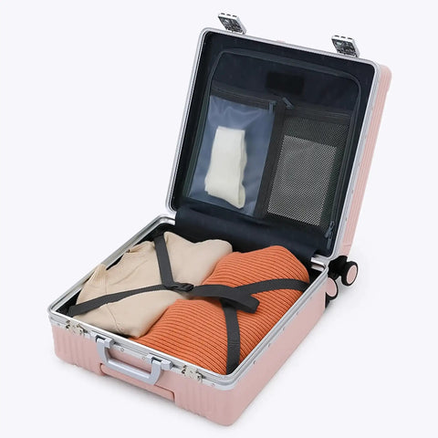 All In One Carry On Mini 19 Inch Smart Hardside Luggage With USB C Charging Front Laptop Compartment Cup And Phone Holder TSA Locks 360 Degree Wheels Grab And Go Ready Fits Overhead Bins Blush with open interior showing packed clothes and organizer pockets