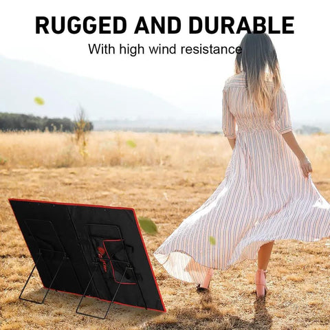 Solar Panel Tilt Mount Stand For Foldable Panels in a field with a person, lightweight stainless steel bracket visible