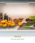 No-Fuss 12 Inch LED Under Cabinet Lighting illuminating kitchen counter with fruits and vegetables, Plug-In or Hardwired.