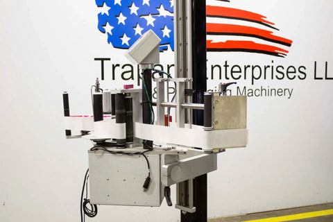 Heavy Duty Compact Modular Label Applicator Built Tough For Relentless Shifts Runs Smooth And Places Labels On Point Daily, side view showing rollers and modular frame.