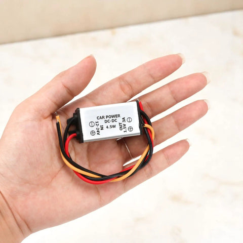 DC Buck Converter Module 24V-12V To 1.5V, 3A Output, 4.5W Power Regulator With 13cm Cable shown in hand