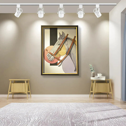 Dope 9W 4000K LED Track Light Heads Dimmable 3 Wire H Type Fixture illuminating wall art in a modern living room.
