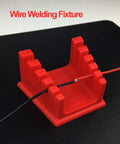 Heavy Duty Soldering Clamp And Welding Stand With Secure Firm Grip For Various Wire Sizes on red wire fixture.