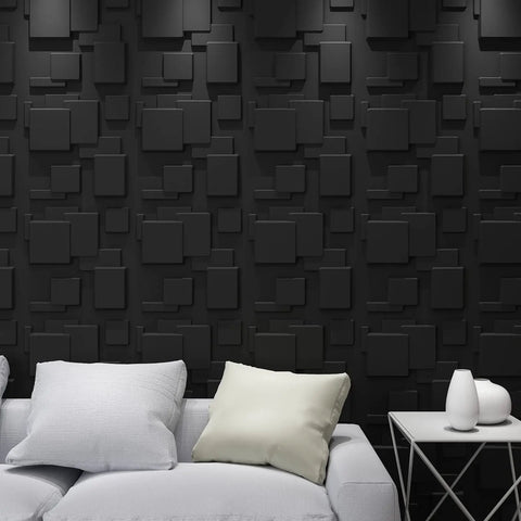 Living room with black 3D wall panels with raised rectangle texture for modern interiors, PVC, 32 square feet coverage.