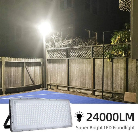 JUDYSSY 6 Pack Led Flood Light Outdoor, 300W Work Light 24000Lm Bright Outdoor Floodlights, illuminating an outdoor area at night.