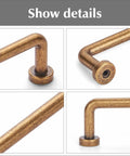 Close-up of Eight Pack Two And A Half Inch Antique Brass Cabinet Handles And Drawer Pulls with screw holes showing vintage style hardware.