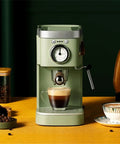 Retro Green Coffee Machine With Milk Frother And Capsule Pod Brew Your Daily Brew Espresso Maker For Home Kitchen Nonpressurized And Pressurized Basket Options Easy Cappuccino Latte And Americano In Minutes on a kitchen counter with coffee beans.
