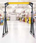 Heavy Duty Portable Gantry Crane 2 Ton 4400 Lb Load Capacity Adjustable Lift Rig Ranging From 97 To 141 Inches Tall in workshop.