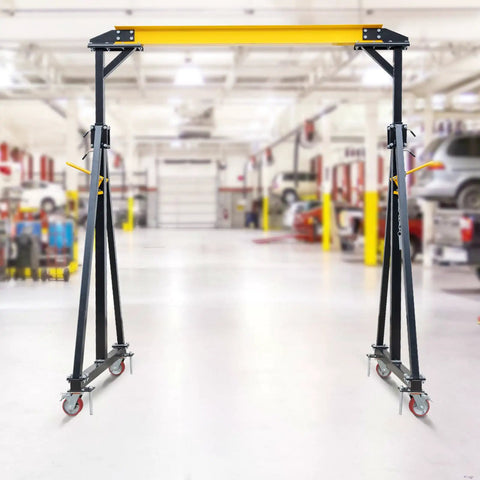 Heavy Duty Portable Gantry Crane 2 Ton 4400 Lb Load Capacity Adjustable Lift Rig Ranging From 97 To 141 Inches Tall in workshop.