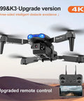 1080P Dual HD Camera FPV Quadcopter for Adults and Beginners hovering in flight with upgraded remote control and visible WiFi live video