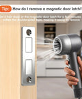 Hair dryer aimed at Three Pack Magnetic Door Catch Set With Dual Magnets Heavy Duty 30 Lb Cabinet Catches Secure With Screws Or Double Sided Tape Silver Finish For Cabinets And Drawers for removal