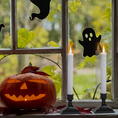 Two 9.64 inch ivory window candles with cozy warm glow beside Jack-o'-lantern, Eight Flameless Taper Candles With Remote Controls And Timer