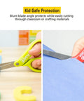 5 Inch Kid Safe Scissors With Blunt Tip For Easy Safe Cutting, Left Or Right Hand Use, Ergonomic Grip shown cutting paper