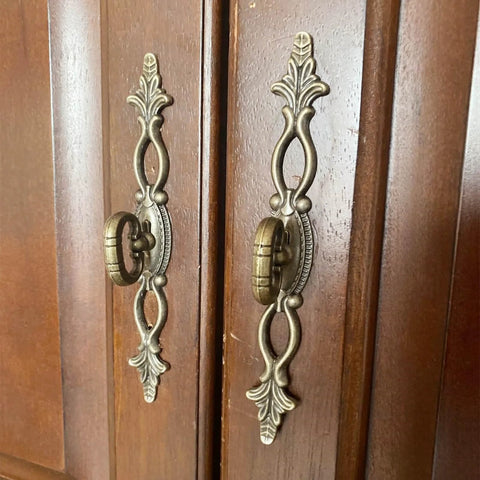 Vintage Style Antique Bronze Cabinet Pulls Handles 2 Pack Hollow Decor on wooden cabinet